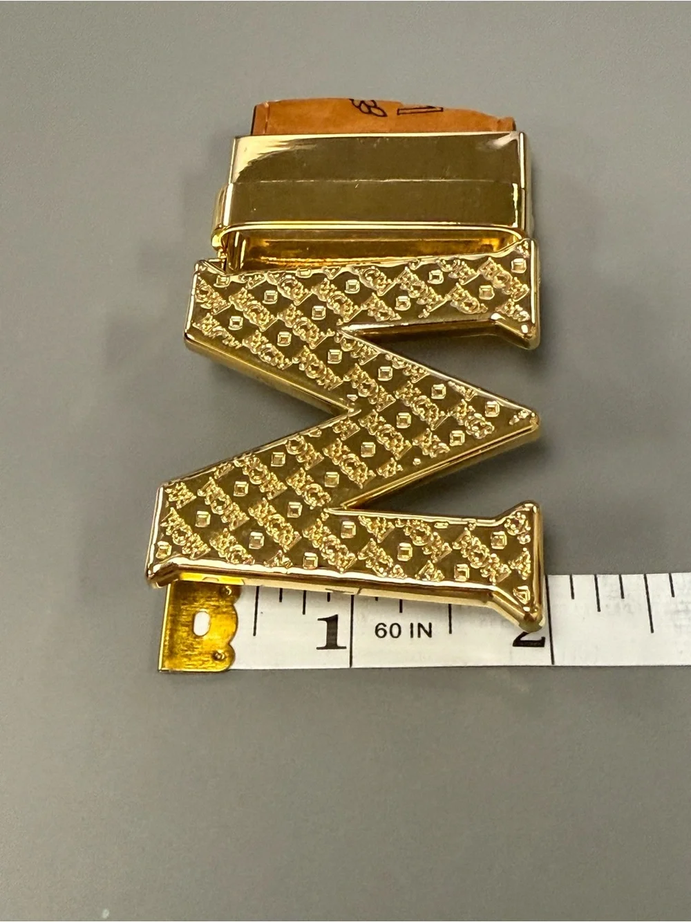 MCM Gold Tone Initial “M” Automatic Ratchet Belt Buckle Designer Logo